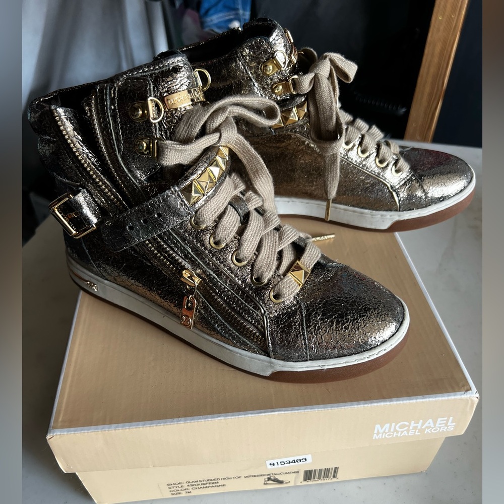 Michael Kors metallic gold high tops size 7 with studs.